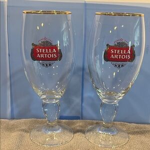 Two (2) Stella Artois Belgium with Gold Rim, 40 CL, 13.5 oz., Stem Glasses